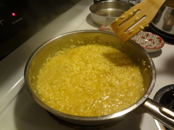 stirring the risotto